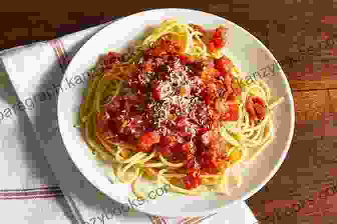 A Close Up Of A Plate Of Pasta With A Rich Tomato Sauce HOMEMADE PASTA DIET BOOK: Learn How To Make Delicious And Mouthwatering Pasta Without Hassle