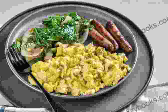 A Plate Of Keto Friendly Breakfast Foods, Including Scrambled Eggs, Bacon, Avocado, And Mushrooms Collection Of Ketogenic Vegetarian Diet Recipes : Healthy Keto Meals For Every Day For Breakfast Dinner Supper